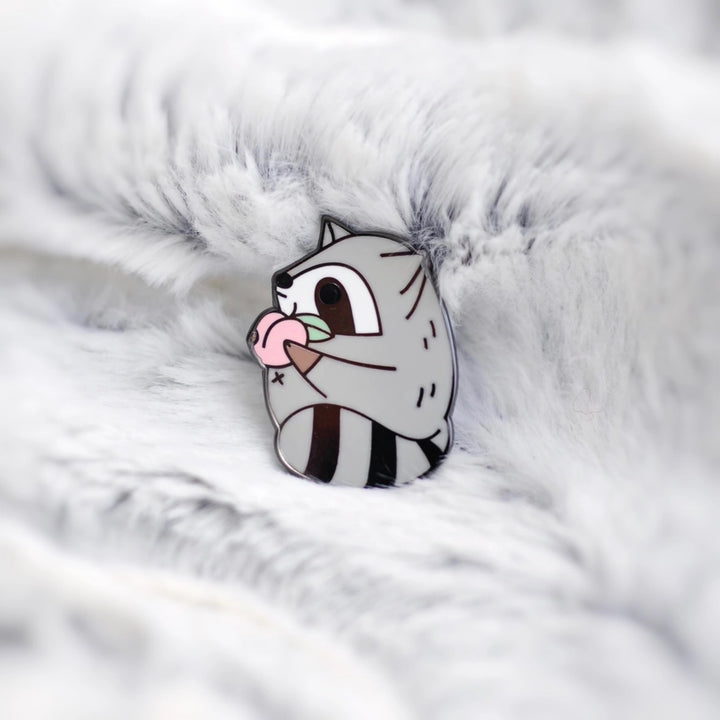 Raccoon and Peach Enamel Pin